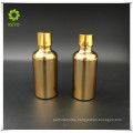 best selling cosmetic container gold glass bottle